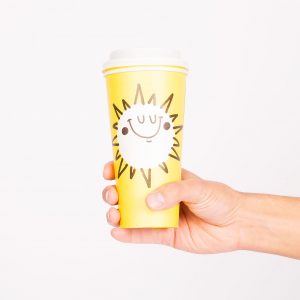 reusable coffee cup with yellow sun design