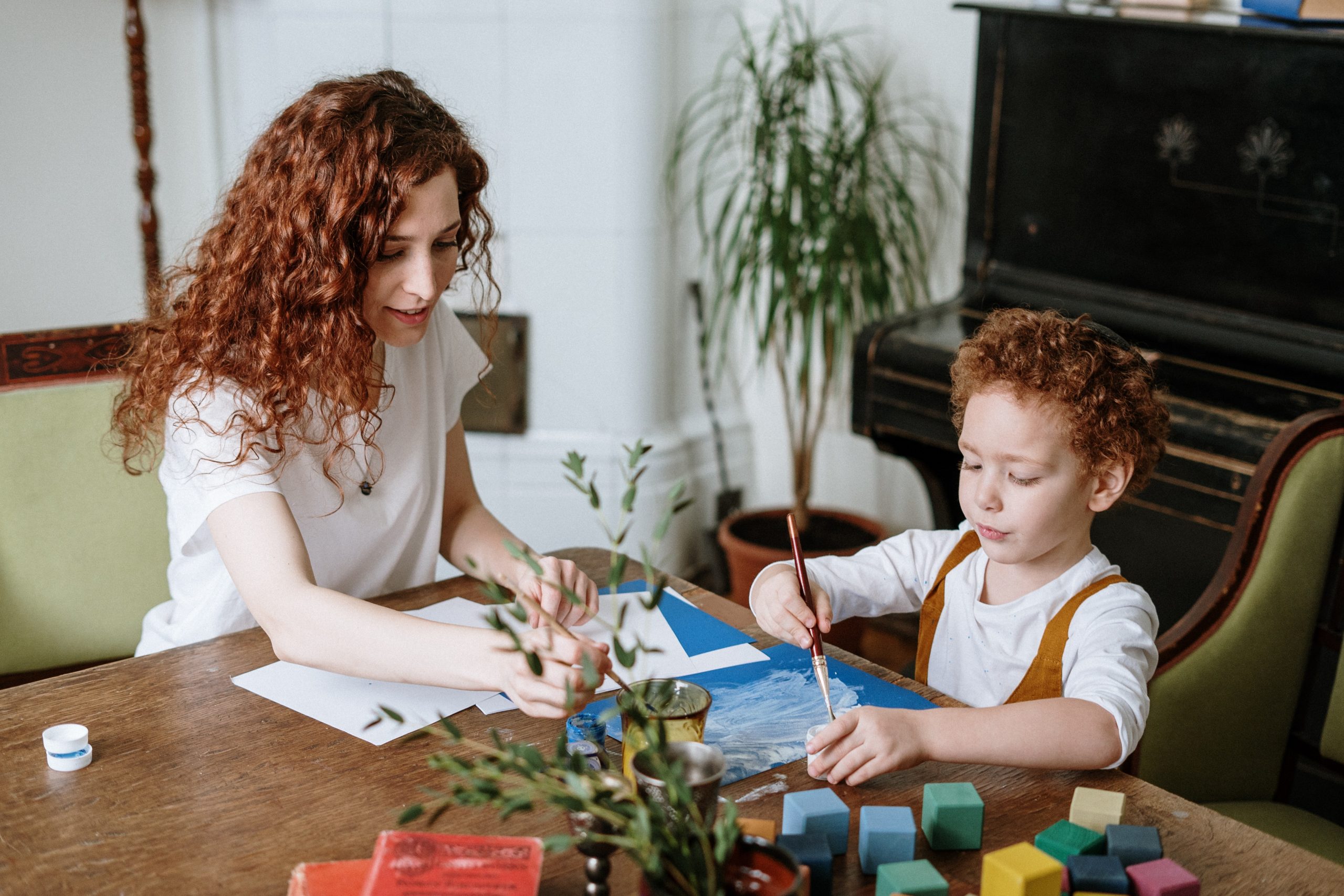 Mother and son painting